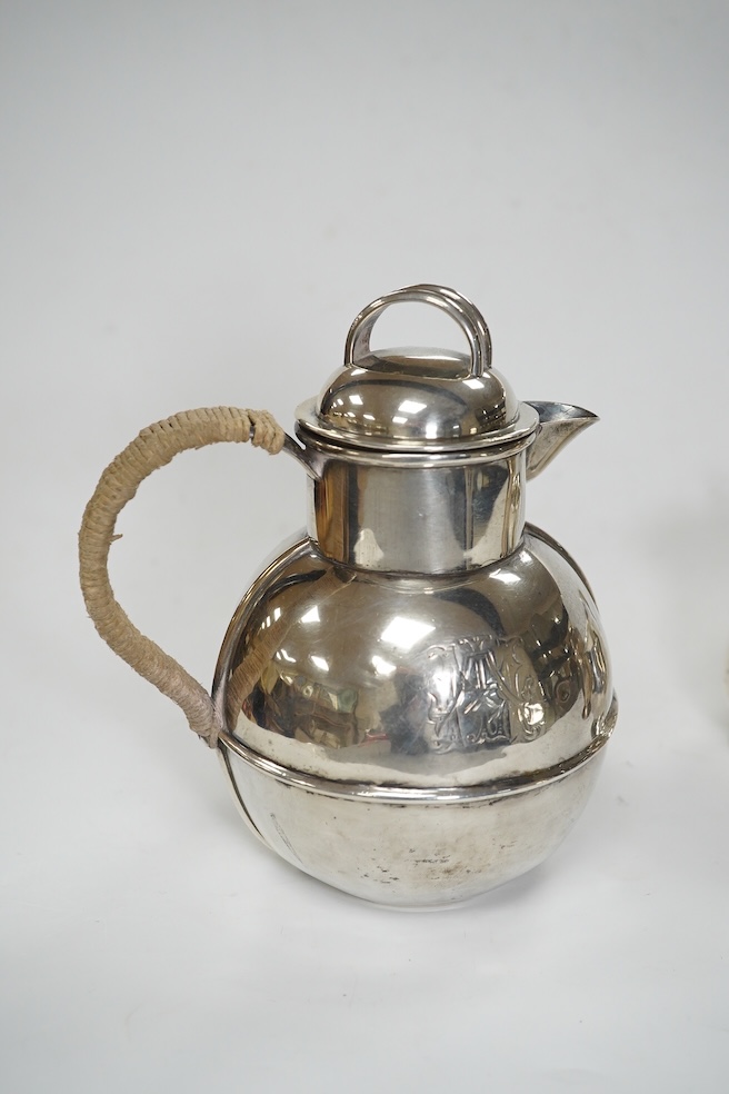 A late Victorian silver Guernsey milk can, marks rubbed, 14cm, a small silver mug and a Scottish silver kitchen pepper, Hamilton & Inches, Edinburgh, 1898, gross weight 16.4 oz. Condition - poor to fair